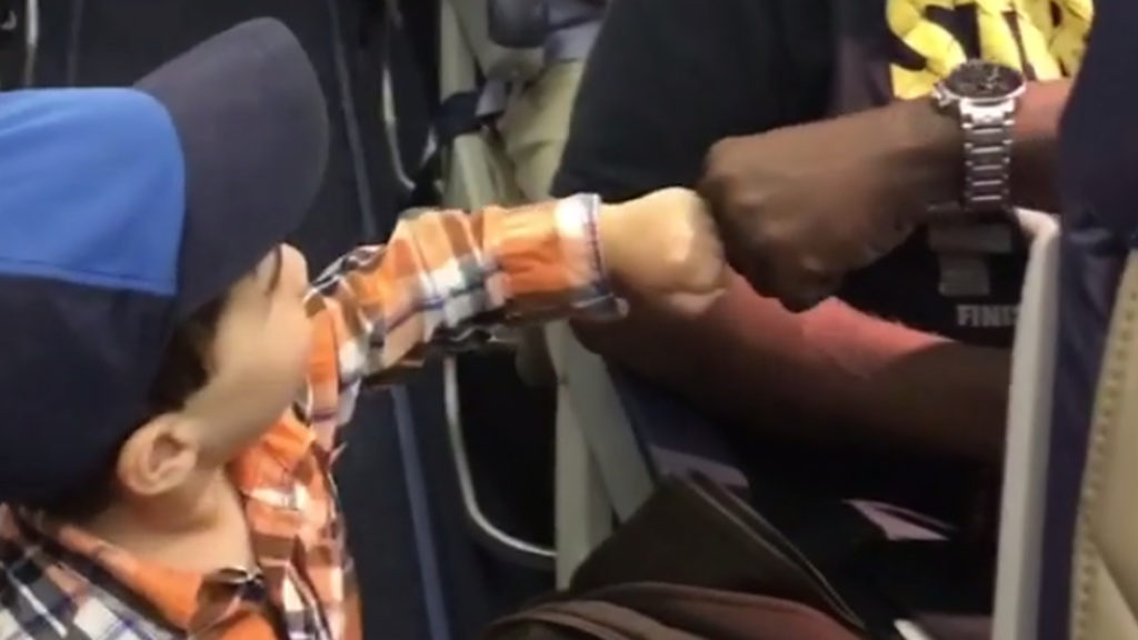 fist-bump-plane-toddler-summer-flight-friends-love-vacation-vacay